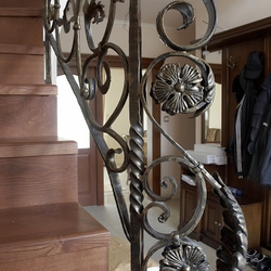 Detail of an interior staircase railing  forged railing by UKOVMI