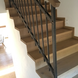 Forged interior staircase railing  simple railing with a wooden handle