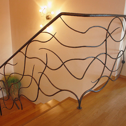 Hand wrought iron interior staircase railing