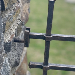 A wrought iron fence made for a cemetery - gates and fences