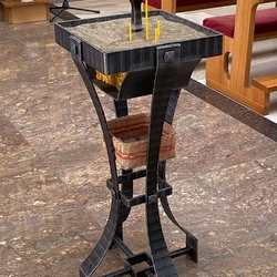 A wrought iron table in the Church of God's Mercy in Ladomirová near Svidník (Slovakia)