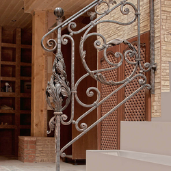 A hand wrought iron railing A hand wrought iron railing