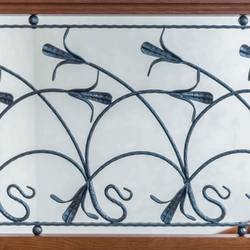 Wrought iron railings combined with wood Wrought iron railings combined with wood