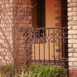 Forged railings in the exterior of a family house made in Artistic Smithery UKOVMI