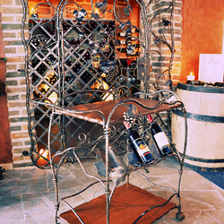 A wrought iron grilles and accessories for a wine cellar
