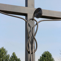 A wrought iron cross A wrought iron cross