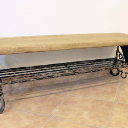  A hand wrought iron shoe rack 