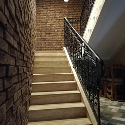 An interior staircase railing in an apartment hotel - luxury railings An interior staircase railing in an apartment hotel - luxury railings