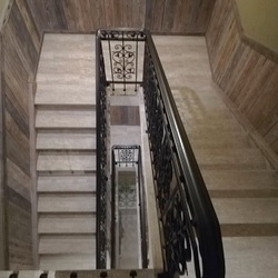 A multistorey interior railing in an apartment hotel - luxury wrought-iron railing from UKOVMI A multistorey interior railing in an apartment hotel - luxury wrought-iron railing from UKOVMI