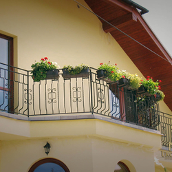 Forged pot holders on the balcony