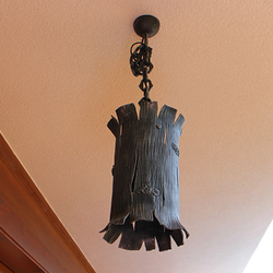 Artistic hand-forged lighting BARK with a logo UKOVMI made for a client as the original lighting
