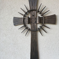 Hand-forged cross with a crown of thorns Hand-forged cross with a crown of thorns