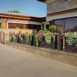 A special forged fence with flowerpots