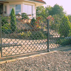 A wrought iron gate - waves