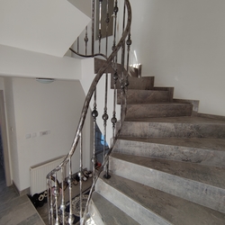 Forged interior staircase railing – high quality helical railing by UKOVMI