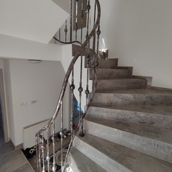 Forged interior staircase railing – high quality helical railing by UKOVMI Forged interior staircase railing – high quality helical railing by UKOVMI