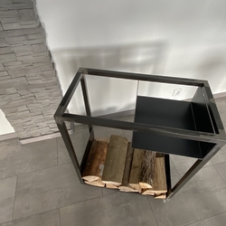 A firewood rack with wheels – a high quality firewood rack fits next to a fireplace and is suitbale for summer barbecues A firewood rack with wheels – a high quality firewood rack fits next to a fireplace and is suitbale for summer barbecues
