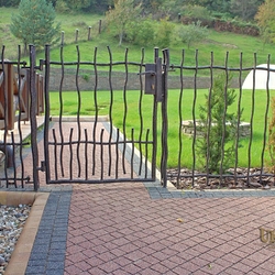 A wrought iron fence BABIKA - cottage - 'Seclusion near the forest'