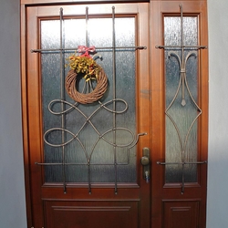 A door wrought iron grille