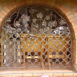 A fixed wrought iron grille