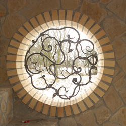 A wrought iron grille - roots