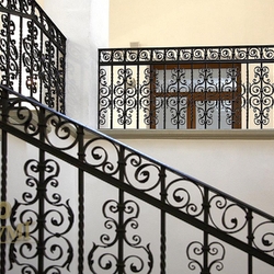 A wrought iron railing of the 15th-century building A wrought iron railing of the 15th-century building
