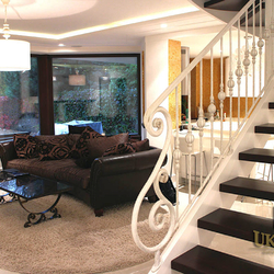 A wrought iron railing in a family house - ivory A wrought iron railing in a family house - ivory