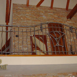 A wrought iron railing - interior - gallery