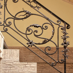 A hand wrought iron railing A hand wrought iron railing