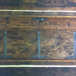 Forged accessories on a vintage cabin door