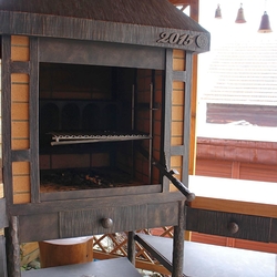 A wrought iron fireplace set A wrought iron fireplace set