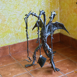 A medieval three-headed dragon - a fairy tale about wrought iron tools A medieval three-headed dragon - a fairy tale about wrought iron tools