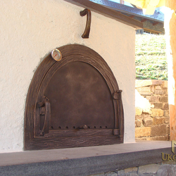 A wrought iron door for a clay stove