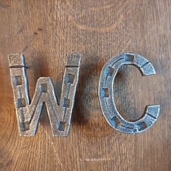 Forged WC sign