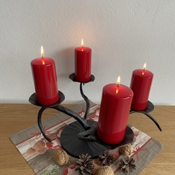 An original forged candle holder by UKOVMI for Christmas time with family
