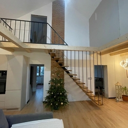 Modern metal railing on the stairs of a family house - interior railing Modern metal railing on the stairs of a family house - interior railing