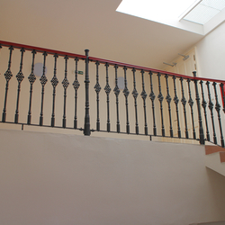 Hand wrought iron interior staircase railing - staircase railings in a historic house Hand wrought iron interior staircase railing - staircase railings in a historic house
