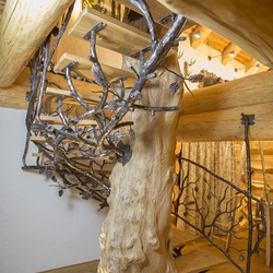 An artistic spiral staircase in a hunting lodge 