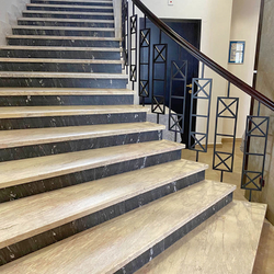 Metal spiral railing with wooden handrail on the staircase of the Tatra hotel Metal spiral railing with wooden handrail on the staircase of the Tatra hotel