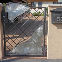 A modern wrought iron gate - stainless steel - iron combination