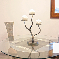 Polished, forged candleholder in a modern design  design candleholder