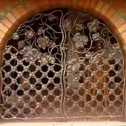 A movable wrought iron grille