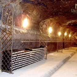 Wrought iron screens in a wine cellar