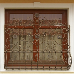 High quality decorative grilles by UKOVMI on the windows for a family house  