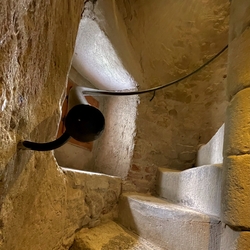 A spiral handrail on the staircase of the church tower of the Renaissance church from the 16th century in Stropkov - Slovakia A spiral handrail on the staircase of the church tower of the Renaissance church from the 16th century in Stropkov - Slovakia