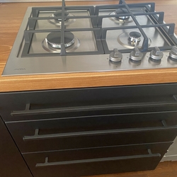 Modern forged handles on kitchen cabinet drawers Modern forged handles on kitchen cabinet drawers