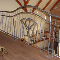 A wrought iron railing - interior - gallery