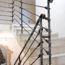 A wrought iron stair railing - Knot pattern A wrought iron stair railing - Knot pattern